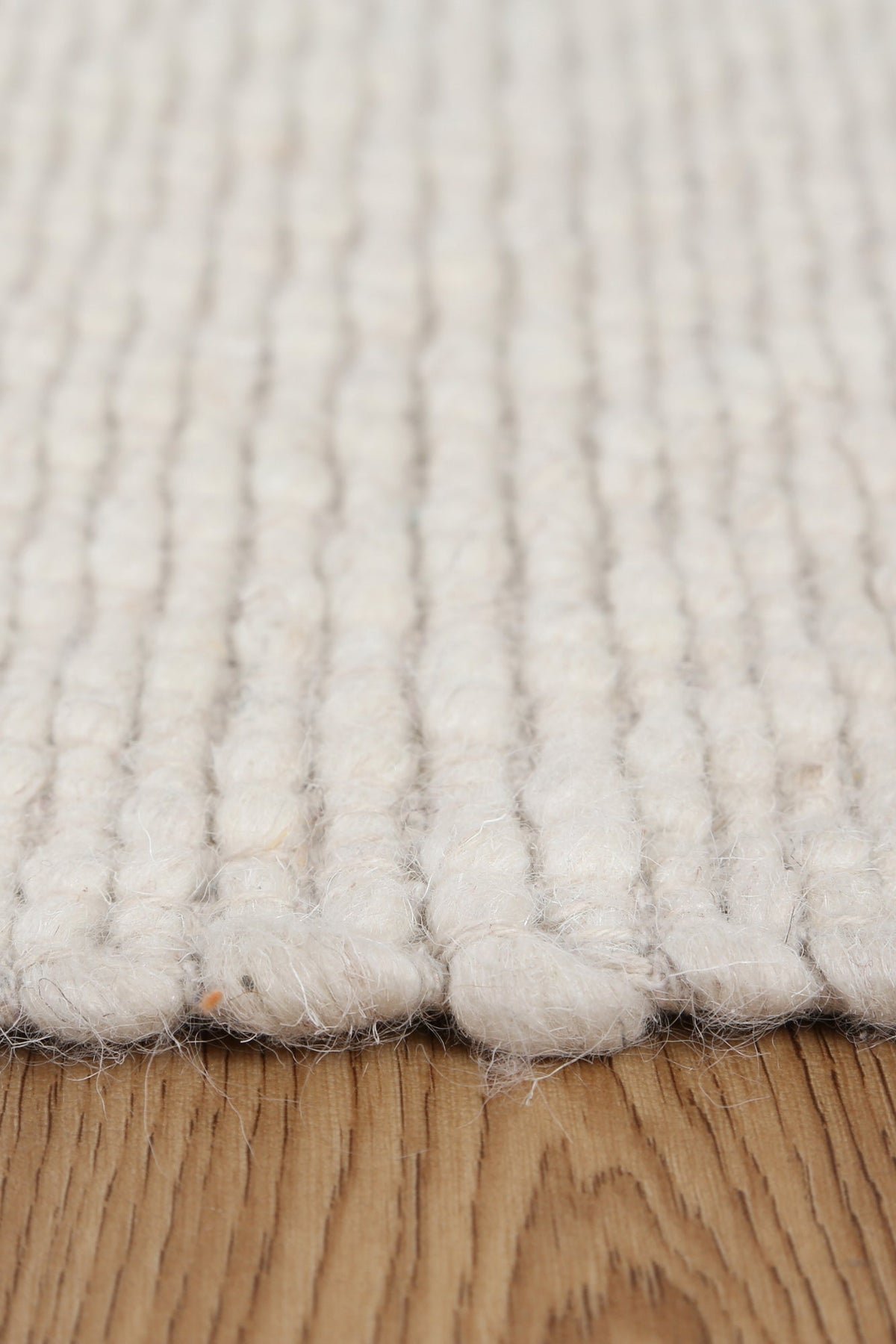 Obsidian Ivory Wool Blend Textured Rug - IVOR