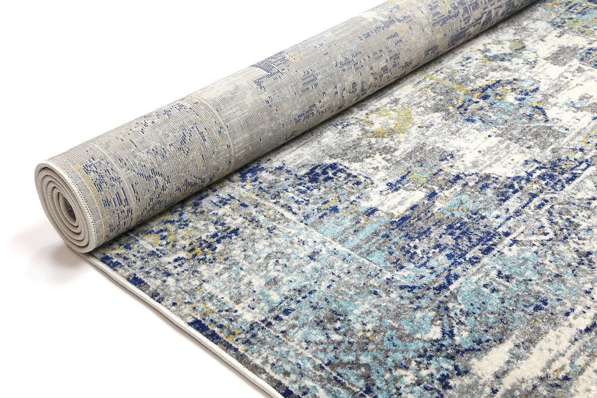 Dainty Faded Blue and Yellow Rug